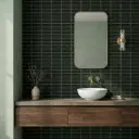 Black glue-finish patterned wall tile with horizontal layered panel design in square format, shown as a single display piece