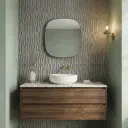 Grey glue-finish patterned wall tile with a dynamic geometric relief texture in a square format, shown as a single display piece.