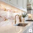 Decorative glossy wall tile featuring a marble look pattern with soft pink and white shades highlighted by elegant gold veins