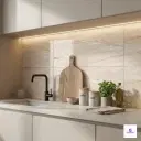 Elegant beige marble look ceramic wall tiles installed as modern kitchen backsplash.”