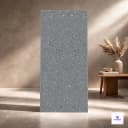 Full body matt vitrified tile featuring a modern grey base with multicolor flake-speckled detailing, creating a terrazzo-inspired surface while offering excellent durability, easy maintenance, and long-lasting performance