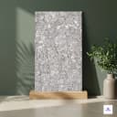 Grey terrazzo look porcelain tile natural stone chips texture contemporary interior tile